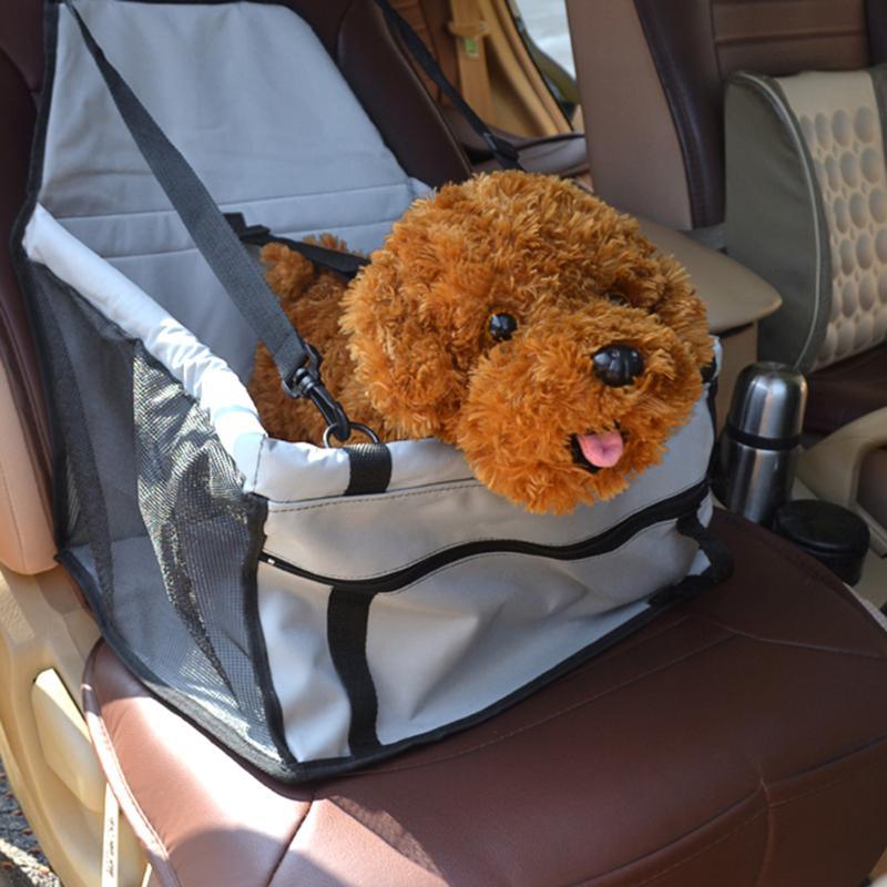 Waterproof Dog Carrier Seat by Dog Hugs Cat, designed for small and medium-sized dogs and cats, ideal for travel.