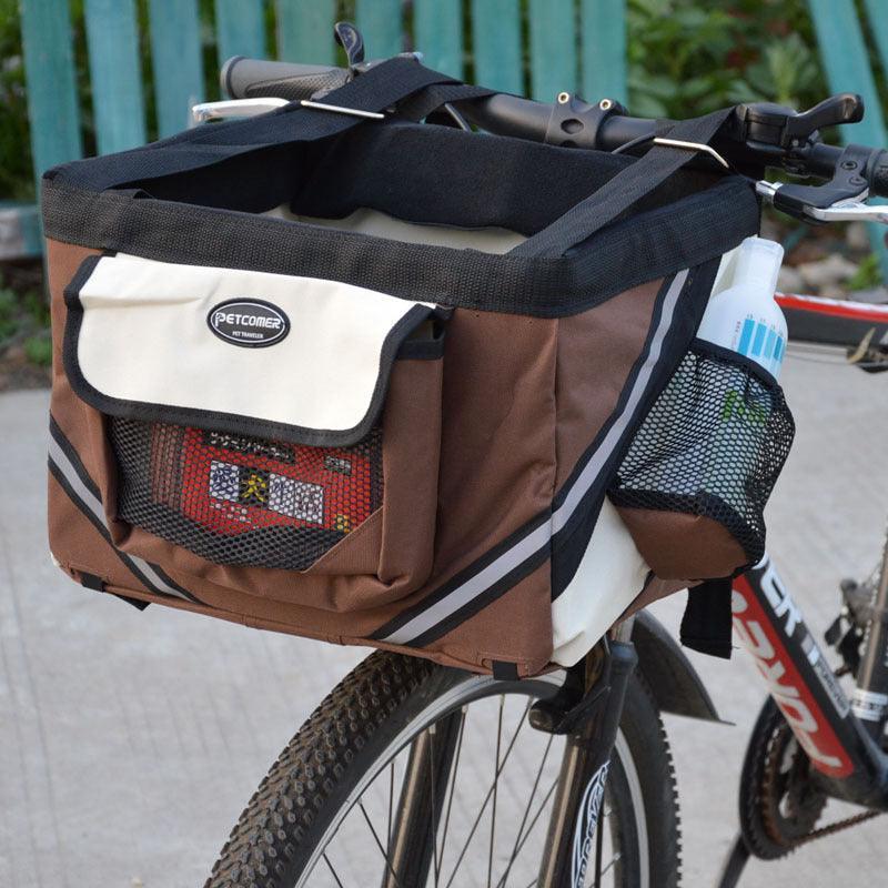 Dog Hugs Cat Bikepaws Pet Traveler removable front bicycle carrier for small cats and dogs, designed for safe pet travel.